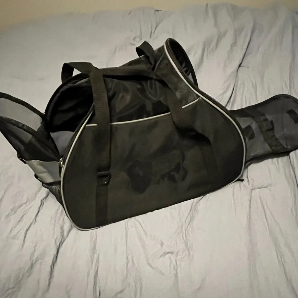 NICE puppy carrier!! Duffel bag style